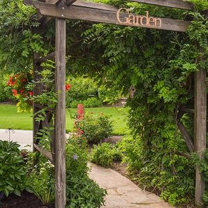 100 Garden Pathway Ideas and Inspiration - Golly Gee Gardening #gardenpaths #gardenpathways #gardeninspiration #gardenideas