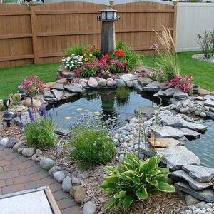 80 Garden Pond Ideas and Designs - Golly Gee Gardening #gardenpond #gardenponds #gardeninspiration #gardenideas